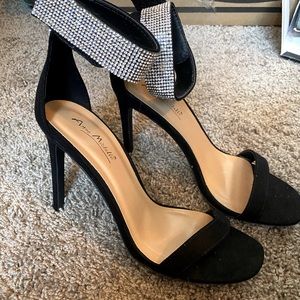 Black strapped heels